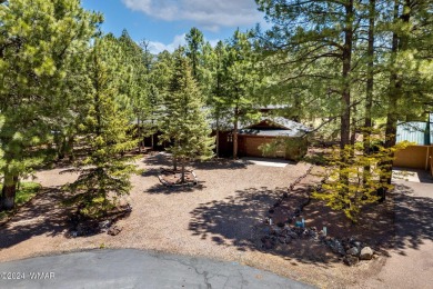 Discover your dream home on the fairway of Pinetop Lakes Country on Pinetop Lakes Golf and Country Club in Arizona - for sale on GolfHomes.com, golf home, golf lot