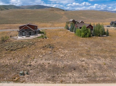 Rare opportunity to own two adjacent, flat parcels in the Grand on Grand Elk Ranch and Club in Colorado - for sale on GolfHomes.com, golf home, golf lot