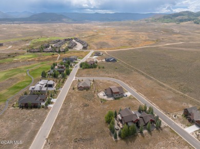 Rare opportunity to own two adjacent, flat parcels in the Grand on Grand Elk Ranch and Club in Colorado - for sale on GolfHomes.com, golf home, golf lot
