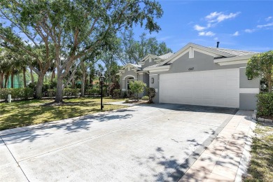 Wake up to breathtaking sunrises over the water from the comfort on University Park Country Club in Florida - for sale on GolfHomes.com, golf home, golf lot