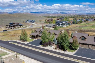 This stunning mountain retreat offers a perfect blend of rustic on Grand Elk Ranch and Club in Colorado - for sale on GolfHomes.com, golf home, golf lot