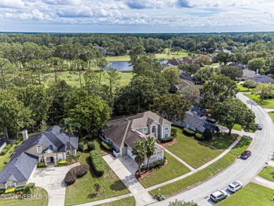 Elegant Pool Home in Eagle Harbor with view of the golf course on Eagle Harbor Golf Club in Florida - for sale on GolfHomes.com, golf home, golf lot