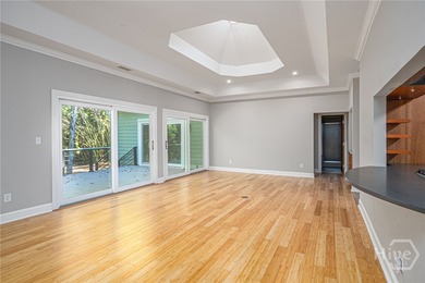 This beautiful 3-bedroom, 3-bath home w/ a bonus room offers the on The Landings Club - Marshwood in Georgia - for sale on GolfHomes.com, golf home, golf lot