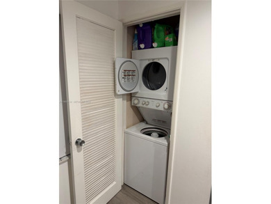 Excellent unit overlooking the golf course and lake on Palm-Aire Country Club and Resort - The Oaks in Florida - for sale on GolfHomes.com, golf home, golf lot