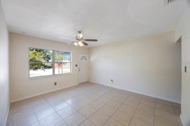 One or more photo(s) has been virtually staged. Charming on Mangrove Bay Golf Course in Florida - for sale on GolfHomes.com, golf home, golf lot