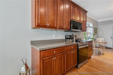 Come see this beautifully maintained home tucked away on a quiet on Kings Grant Golf and Country Club in North Carolina - for sale on GolfHomes.com, golf home, golf lot