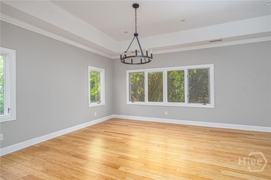 This beautiful 3-bedroom, 3-bath home w/ a bonus room offers the on The Landings Club - Marshwood in Georgia - for sale on GolfHomes.com, golf home, golf lot