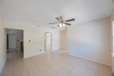 One or more photo(s) has been virtually staged. Charming on Mangrove Bay Golf Course in Florida - for sale on GolfHomes.com, golf home, golf lot