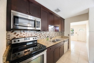 One or more photo(s) has been virtually staged. Charming on Mangrove Bay Golf Course in Florida - for sale on GolfHomes.com, golf home, golf lot