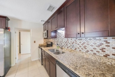 One or more photo(s) has been virtually staged. Charming on Mangrove Bay Golf Course in Florida - for sale on GolfHomes.com, golf home, golf lot