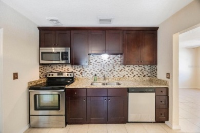 One or more photo(s) has been virtually staged. Charming on Mangrove Bay Golf Course in Florida - for sale on GolfHomes.com, golf home, golf lot