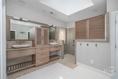 This beautiful 3-bedroom, 3-bath home w/ a bonus room offers the on The Landings Club - Marshwood in Georgia - for sale on GolfHomes.com, golf home, golf lot