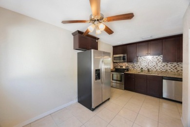One or more photo(s) has been virtually staged. Charming on Mangrove Bay Golf Course in Florida - for sale on GolfHomes.com, golf home, golf lot