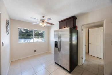 One or more photo(s) has been virtually staged. Charming on Mangrove Bay Golf Course in Florida - for sale on GolfHomes.com, golf home, golf lot