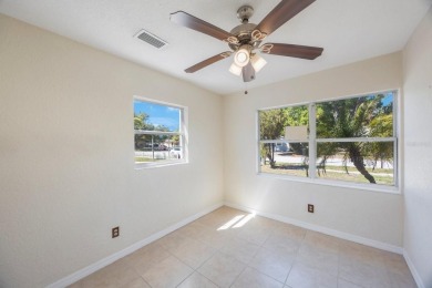 One or more photo(s) has been virtually staged. Charming on Mangrove Bay Golf Course in Florida - for sale on GolfHomes.com, golf home, golf lot