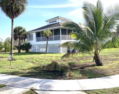 Paradise found within this cute old Florida style, 2 bedroom 2 on Island Country Club in Florida - for sale on GolfHomes.com, golf home, golf lot