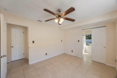 One or more photo(s) has been virtually staged. Charming on Mangrove Bay Golf Course in Florida - for sale on GolfHomes.com, golf home, golf lot