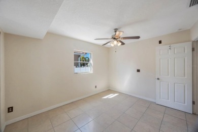 One or more photo(s) has been virtually staged. Charming on Mangrove Bay Golf Course in Florida - for sale on GolfHomes.com, golf home, golf lot