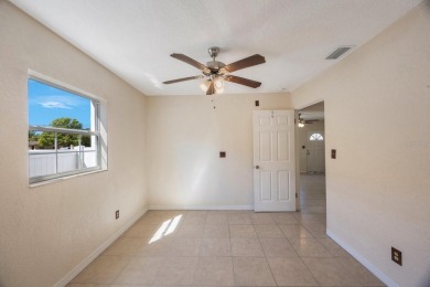 One or more photo(s) has been virtually staged. Charming on Mangrove Bay Golf Course in Florida - for sale on GolfHomes.com, golf home, golf lot