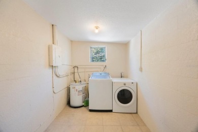 One or more photo(s) has been virtually staged. Charming on Mangrove Bay Golf Course in Florida - for sale on GolfHomes.com, golf home, golf lot