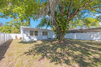One or more photo(s) has been virtually staged. Charming on Mangrove Bay Golf Course in Florida - for sale on GolfHomes.com, golf home, golf lot