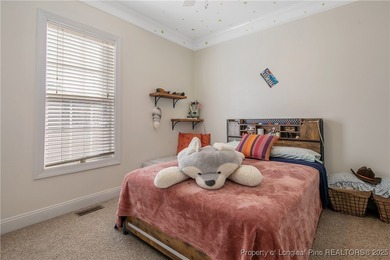 Come see this beautifully maintained home tucked away on a quiet on Kings Grant Golf and Country Club in North Carolina - for sale on GolfHomes.com, golf home, golf lot