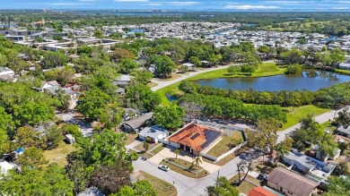 One or more photo(s) has been virtually staged. Charming on Mangrove Bay Golf Course in Florida - for sale on GolfHomes.com, golf home, golf lot