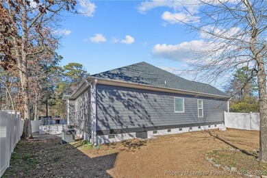 Come see this beautifully maintained home tucked away on a quiet on Kings Grant Golf and Country Club in North Carolina - for sale on GolfHomes.com, golf home, golf lot