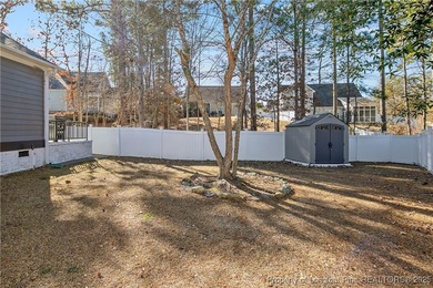 Come see this beautifully maintained home tucked away on a quiet on Kings Grant Golf and Country Club in North Carolina - for sale on GolfHomes.com, golf home, golf lot