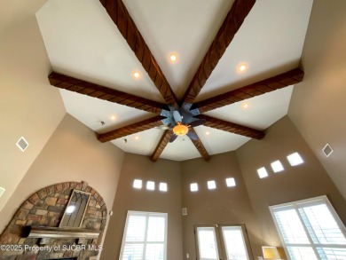 Luxury can become a habit in this elegant Earth & Stone custom on San Juan Country Club in New Mexico - for sale on GolfHomes.com, golf home, golf lot
