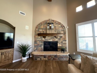 Luxury can become a habit in this elegant Earth & Stone custom on San Juan Country Club in New Mexico - for sale on GolfHomes.com, golf home, golf lot