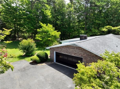 Beautiful Brick 3 Bedroom, 2 Full Bath, Well Maintained Home on Pilot Knob Park Country Club in North Carolina - for sale on GolfHomes.com, golf home, golf lot