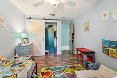 Tucked away in Windmill Pointe of Tarpon Lake, this tastefully on Lansbrook Golf Club in Florida - for sale on GolfHomes.com, golf home, golf lot