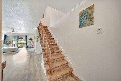 Prime location in the charming Sandpiper Point community--walk on Eco Golf Club in Florida - for sale on GolfHomes.com, golf home, golf lot