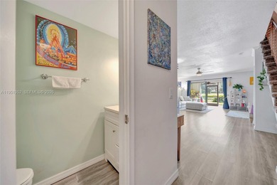 Prime location in the charming Sandpiper Point community--walk on Eco Golf Club in Florida - for sale on GolfHomes.com, golf home, golf lot