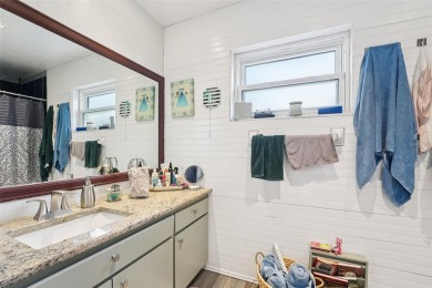 Tucked away in Windmill Pointe of Tarpon Lake, this tastefully on Lansbrook Golf Club in Florida - for sale on GolfHomes.com, golf home, golf lot