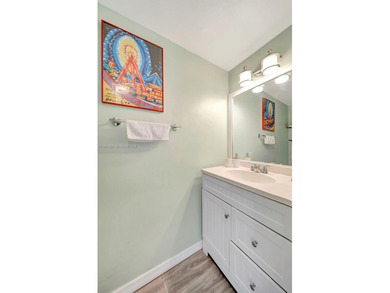 Prime location in the charming Sandpiper Point community--walk on Eco Golf Club in Florida - for sale on GolfHomes.com, golf home, golf lot