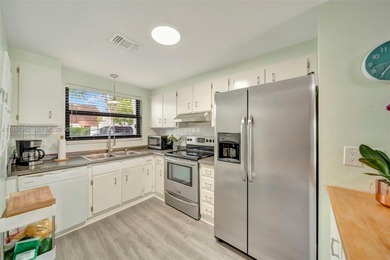 Prime location in the charming Sandpiper Point community--walk on Eco Golf Club in Florida - for sale on GolfHomes.com, golf home, golf lot