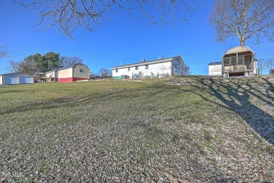 Great investment property/fixer upper with plenty of outdoor on The Crossings Golf Club in Tennessee - for sale on GolfHomes.com, golf home, golf lot