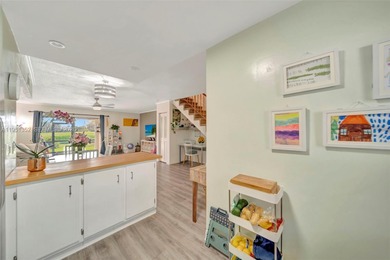 Prime location in the charming Sandpiper Point community--walk on Eco Golf Club in Florida - for sale on GolfHomes.com, golf home, golf lot