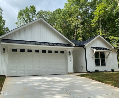 New Construction Custom Designed and Built in gated resort on River Golf and County Club at Lake Royale in North Carolina - for sale on GolfHomes.com, golf home, golf lot