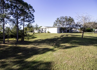 YOU OWN THE LAND!  WELL MAINTAINED 3 BEDROOM 2 BATH HOME IN on Spanish Lakes Golf Village in Florida - for sale on GolfHomes.com, golf home, golf lot