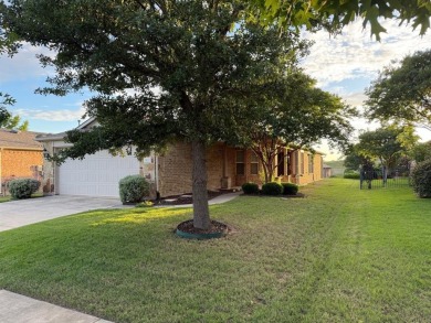 This charming single-family home on 7421 Kite Ln, Frisco, TX was on Frisco Lakes Golf Course in Texas - for sale on GolfHomes.com, golf home, golf lot