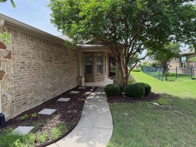 This charming single-family home on 7421 Kite Ln, Frisco, TX was on Frisco Lakes Golf Course in Texas - for sale on GolfHomes.com, golf home, golf lot