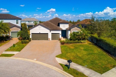 WELCOME TO THIS SOUGHT-AFTER SUMMERVILLE MODEL! This 3-bedroom on Esplanade Golf and Country at Lakewood Ranch in Florida - for sale on GolfHomes.com, golf home, golf lot