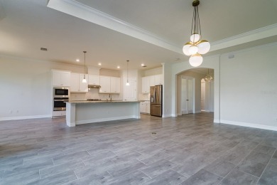 WELCOME TO THIS SOUGHT-AFTER SUMMERVILLE MODEL! This 3-bedroom on Esplanade Golf and Country at Lakewood Ranch in Florida - for sale on GolfHomes.com, golf home, golf lot