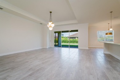 WELCOME TO THIS SOUGHT-AFTER SUMMERVILLE MODEL! This 3-bedroom on Esplanade Golf and Country at Lakewood Ranch in Florida - for sale on GolfHomes.com, golf home, golf lot