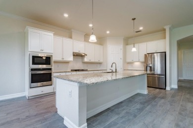 WELCOME TO THIS SOUGHT-AFTER SUMMERVILLE MODEL! This 3-bedroom on Esplanade Golf and Country at Lakewood Ranch in Florida - for sale on GolfHomes.com, golf home, golf lot
