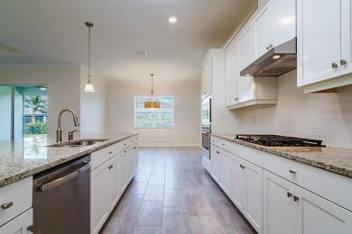 WELCOME TO THIS SOUGHT-AFTER SUMMERVILLE MODEL! This 3-bedroom on Esplanade Golf and Country at Lakewood Ranch in Florida - for sale on GolfHomes.com, golf home, golf lot