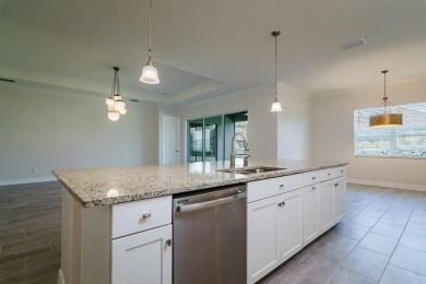 WELCOME TO THIS SOUGHT-AFTER SUMMERVILLE MODEL! This 3-bedroom on Esplanade Golf and Country at Lakewood Ranch in Florida - for sale on GolfHomes.com, golf home, golf lot